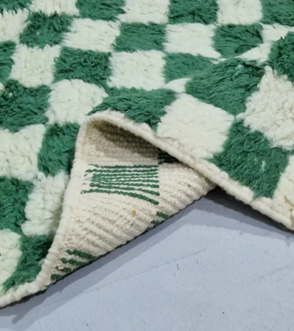 Detailed View of Handmade Moroccan plush wool rug with a green and white checkered pattern