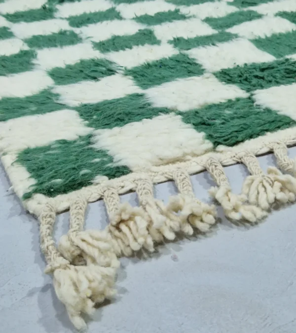 Detailed View of Handmade Moroccan plush wool rug with a green and white checkered pattern