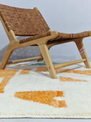 Biege and Orange Blocks Geometric Wool Rug in wall decorated room