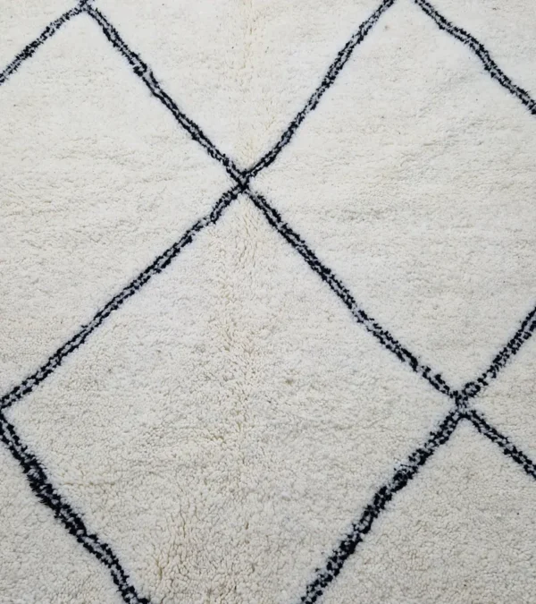 Detailed View of Ivory Hand-knotted Beni Ourain Moroccan wool rug with a Black diamond lattice pattern
