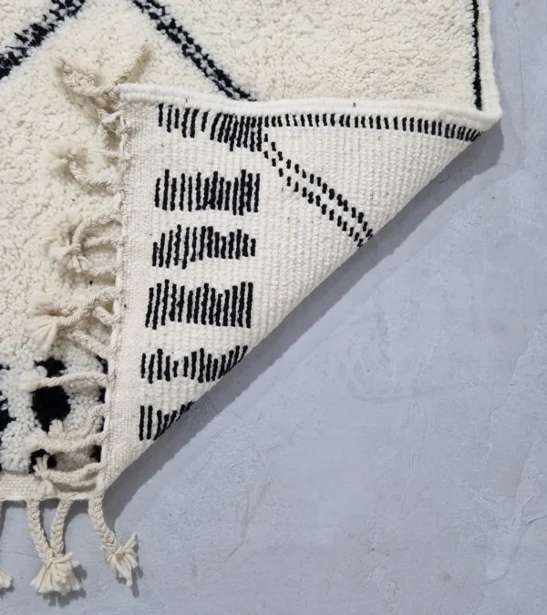Detailed View of Ivory Hand-knotted Beni Ourain Moroccan wool rug with a Black diamond lattice pattern