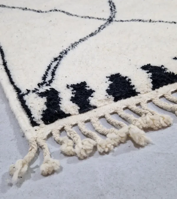 Detailed View of Ivory Hand-knotted Beni Ourain Moroccan wool rug with a Black diamond lattice pattern