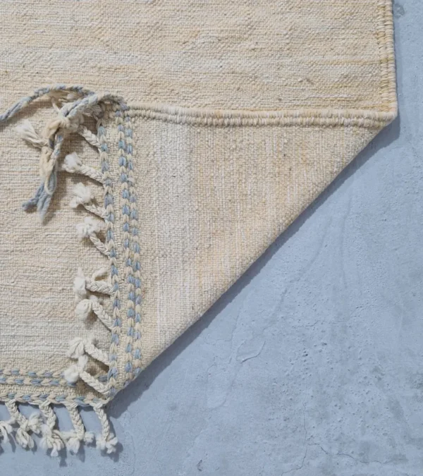Detailed view of Handmade Moroccan Kilim rug with a minimalist diamond pattern