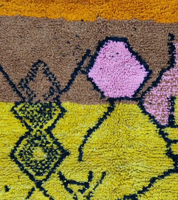 Detailed View of Handwoven tribal wool rug with an abstract color-block pattern