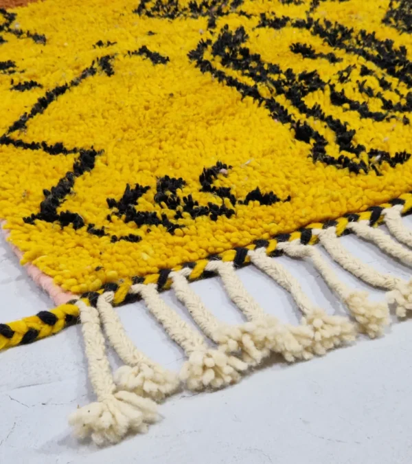 Detailed View of Handwoven tribal wool rug with an abstract color-block pattern