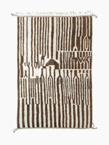 Top View of Handwoven wool rug with a bold stripe and tribal pattern for indoor/outdoor use