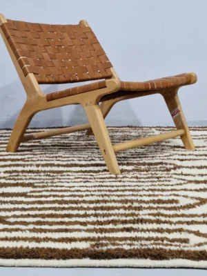 Brown and Ivory Handwoven wool rug with a bold stripe and tribal pattern for indoor/outdoor use