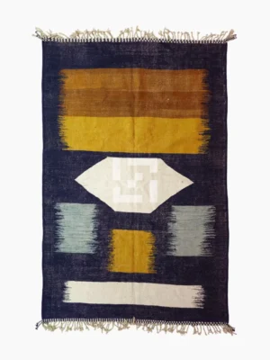 Top View of Alice handmade Kilim flatweave rug with a boho geometric design in navy, yellow, brown, and white