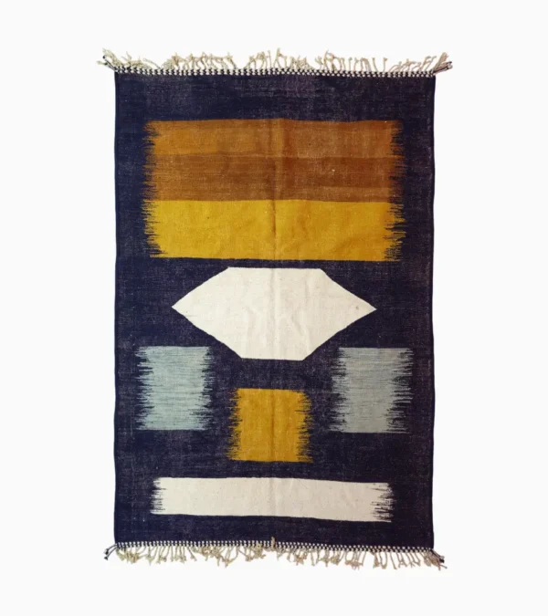 Top View of Alice handmade Kilim flatweave rug with a boho geometric design in navy, yellow, brown, and white