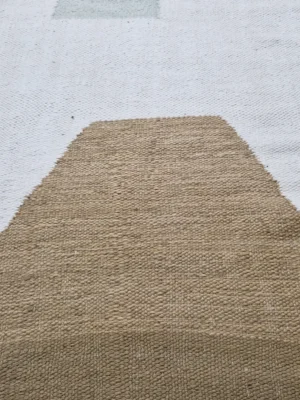 Detailed View Of Aria handmade Moroccan flatweave runner rug with minimalist geometric shapes in tan and grey