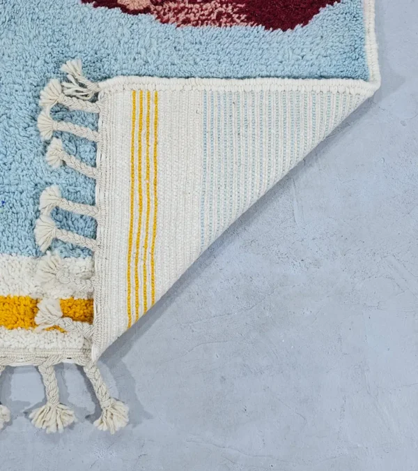 Detailed View of Arij handmade Moroccan wool rug with a modern multicolor design