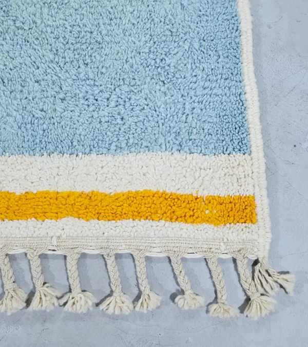 Detailed View of Arij handmade Moroccan wool rug with a modern multicolor design