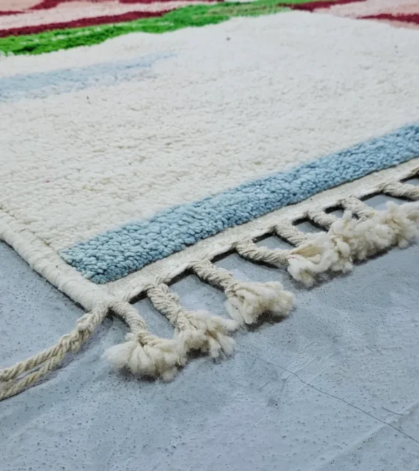 Detailed View of Arij handmade Moroccan wool rug with a modern multicolor design
