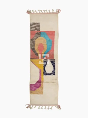 Top View of Avery handmade Azilal wool runner with a mid-century abstract design in coral, yellow, blue, and black