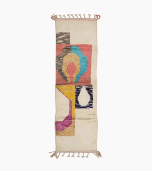 Top View of Avery handmade Azilal wool runner with a mid-century abstract design in coral, yellow, blue, and black