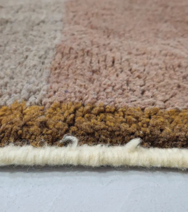 Zoomed In View of Avery handmade Beni Ourain wool rug with a modern geometric neutral design