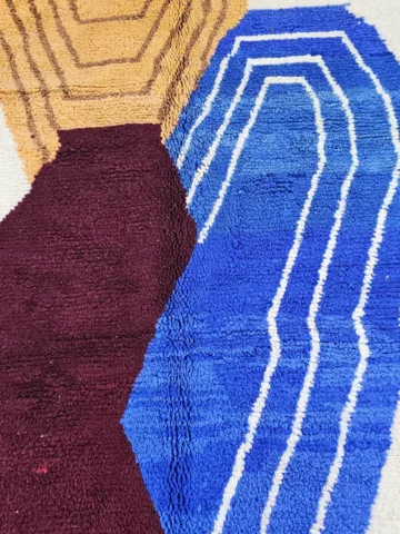 Detailed View of Handmade Beni Ourain wool rug with an abstract geometric pattern and high pile