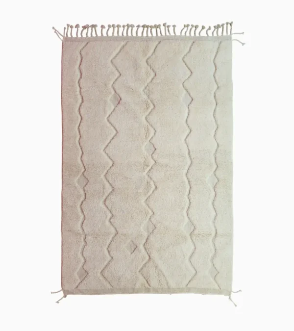 Top View of Berry handmade Beni Mrirt wool rug with a subtle raised geometric pattern on an ivory background