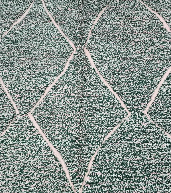 Detailed View of Handmade Moroccan wool rug with a high/low pile and a green textured lattice pattern