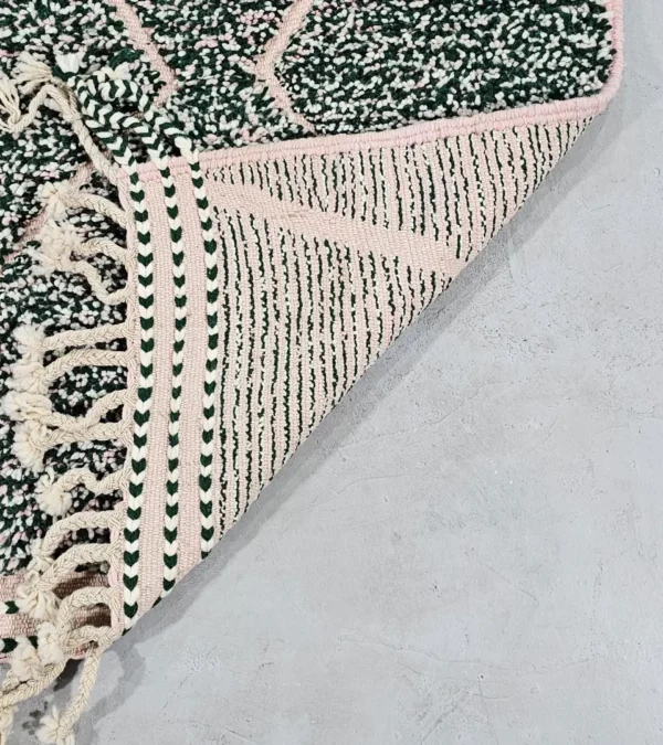 Detailed View of Handmade Moroccan wool rug with a high/low pile and a green textured lattice pattern
