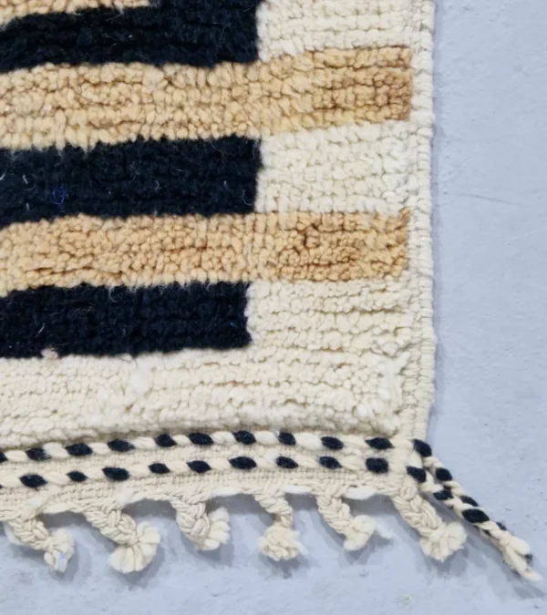 Detailed View of Brann handmade Beni Ourain wool runner with a striped and block design in black, beige, and ivory