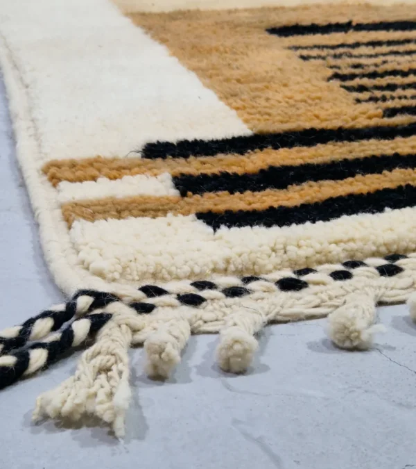 Detailed View of Brann handmade Beni Ourain wool runner with a striped and block design in black, beige, and ivory