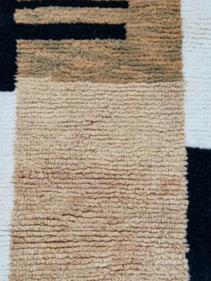 Detailed View of Brann handmade Beni Ourain wool runner with a striped and block design in black, beige, and ivory