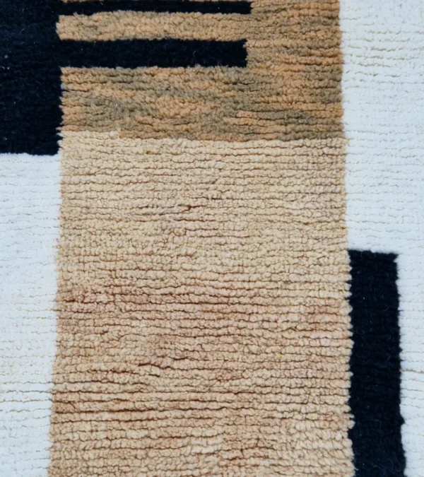Detailed View of Brann handmade Beni Ourain wool runner with a striped and block design in black, beige, and ivory