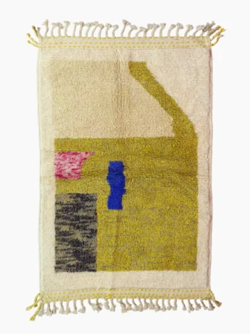 Top View of Handmade Beni Ourain wool rug with a contemporary vibrant abstract color block design in lime yellow, indigo blue, fuchsia pink, and charcoal gray
