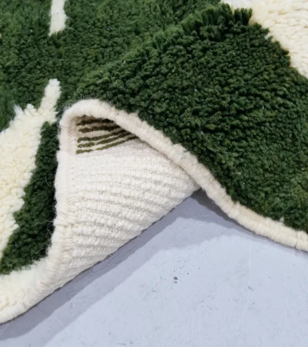 Zoomed View of Handmade Beni Ourain wool runner with a contemporary abstract design in green and ivory