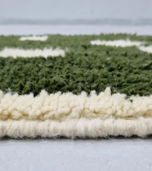 Zoomed View of Handmade Beni Ourain wool runner with a contemporary abstract design in green and ivory