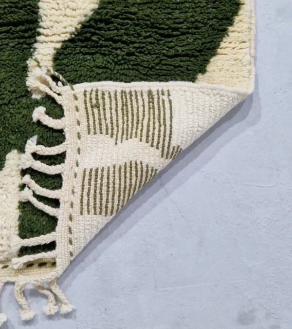 Zoomed View of Handmade Beni Ourain wool runner with a contemporary abstract design in green and ivory