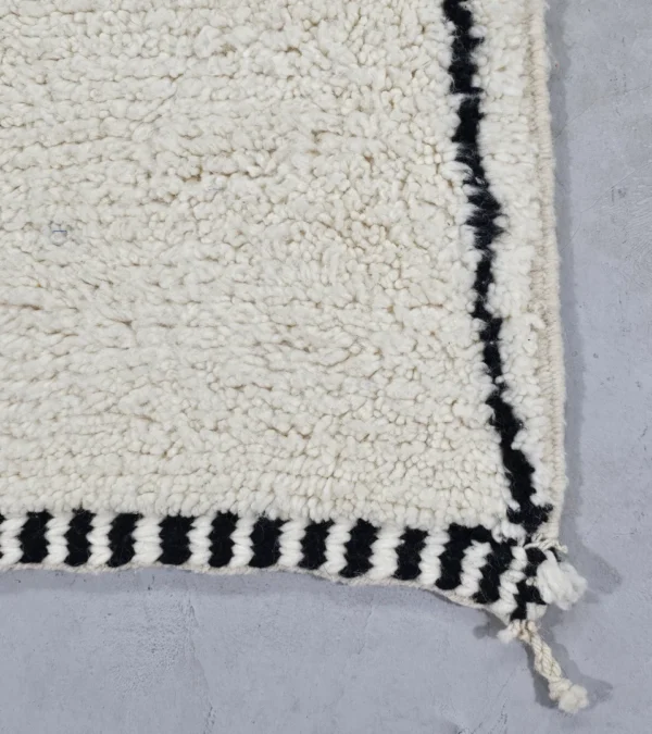 Detailed View of Cora handmade Beni Ourain wool runner with a minimalist striped design in black and ivory