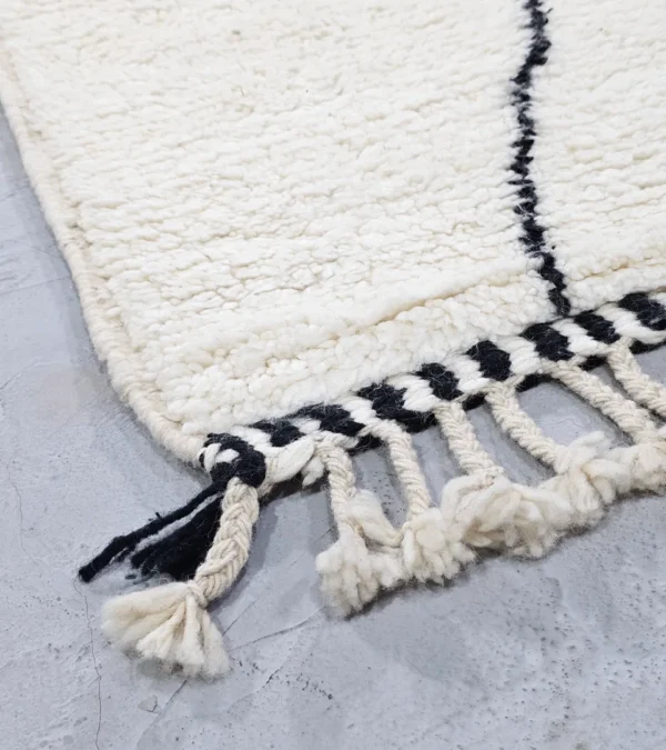 Detailed View of Cora handmade Beni Ourain wool runner with a minimalist striped design in black and ivory