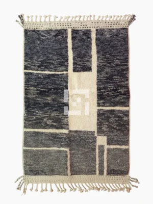 Top View of Cora handmade Beni Mrirt wool rug with a modern textured pattern in charcoal gray and ivory