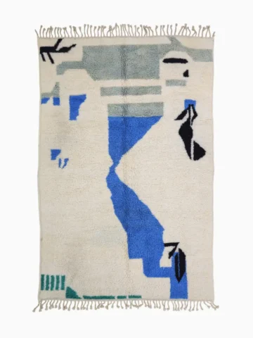 Top View of Diana handmade Beni Ourain wool rug with a contemporary abstract design in blues, grays, black, and green
