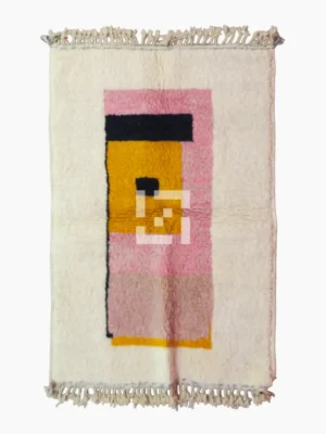 Top View of Elara handmade Beni Ourain wool rug with a colorful block design in vibrant pink, mustard yellow, and charcoal gray