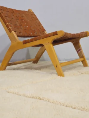 Elara handmade Beni Mrirt wool rug with a Moroccan ivory diamond design in room