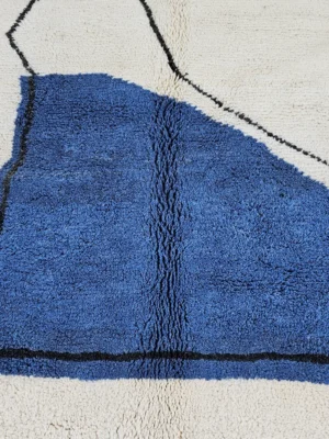 Detailed View of Handmade Moroccan hand-knotted wool rug with plush high-pile texture and bold abstract design from Elara collection