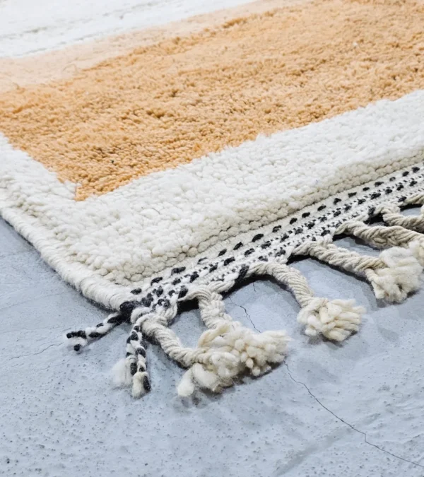 Detailed View of Handmade Moroccan hand-knotted wool rug with plush high-pile texture and bold abstract design from Elara collection
