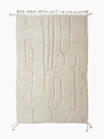 Top View of Eleni handmade Beni Mrirt wool rug with a minimalist ivory geometric design