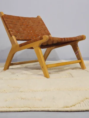 Eleni handmade Beni Mrirt wool rug with a minimalist ivory geometric design in room