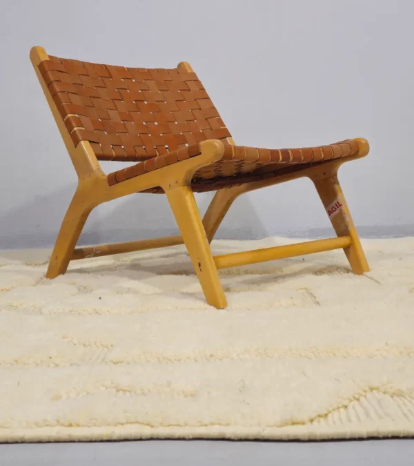 Eleni handmade Beni Mrirt wool rug with a minimalist ivory geometric design in room