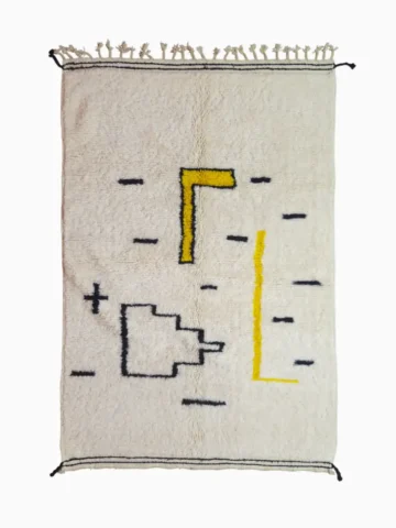Top View of Elly handmade Azilal wool rug with a whimsical abstract design of lines and shapes in black and yellow