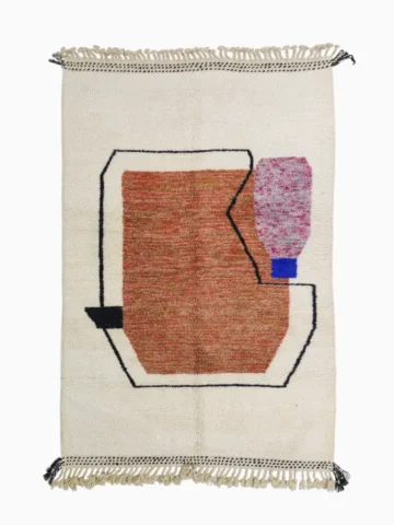 Top View of Fairouz handmade Moroccan wool rug with a modern geometric abstract design in terracotta, pink, and black
