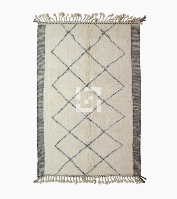 Top View of Ghita handmade Beni Ourain wool rug with a classic dark diamond pattern on an ivory background