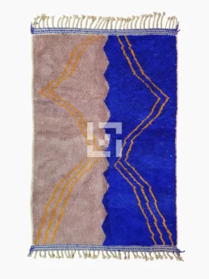 Top View of Handwoven Moroccan rug with a jagged blue and beige design and yellow zigzag lines