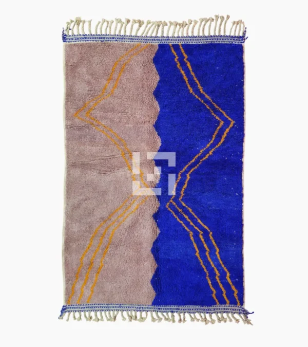 Top View of Handwoven Moroccan rug with a jagged blue and beige design and yellow zigzag lines