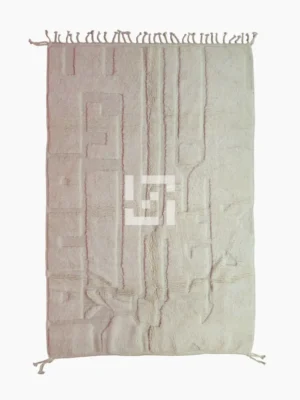 Top View of handmade Moroccan wool rug with a subtle geometric design created by varying pile heights in neutral tones