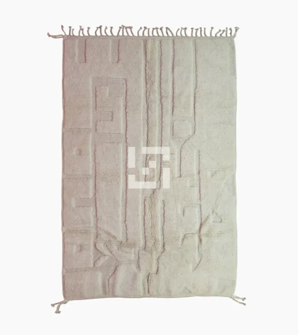 Top View of handmade Moroccan wool rug with a subtle geometric design created by varying pile heights in neutral tones